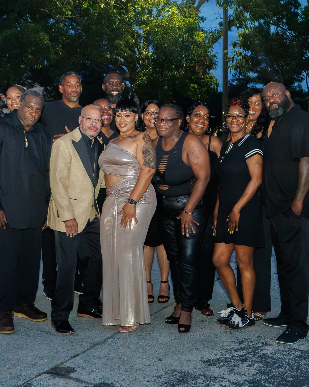 Full family and friends group portrait at a 50th birthday celebration