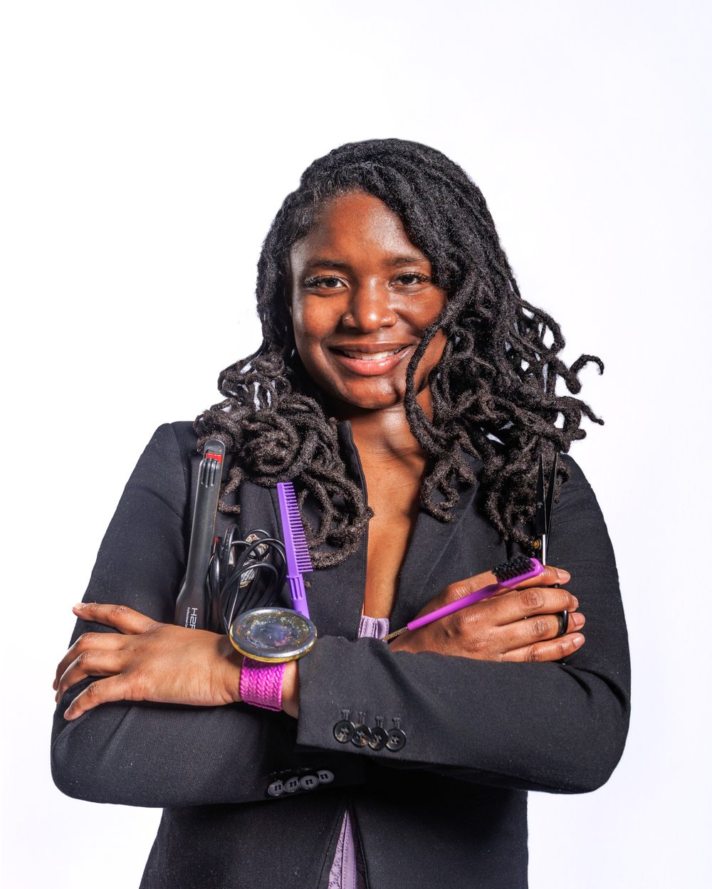 Cosmetologist branding portrait with styling tools
