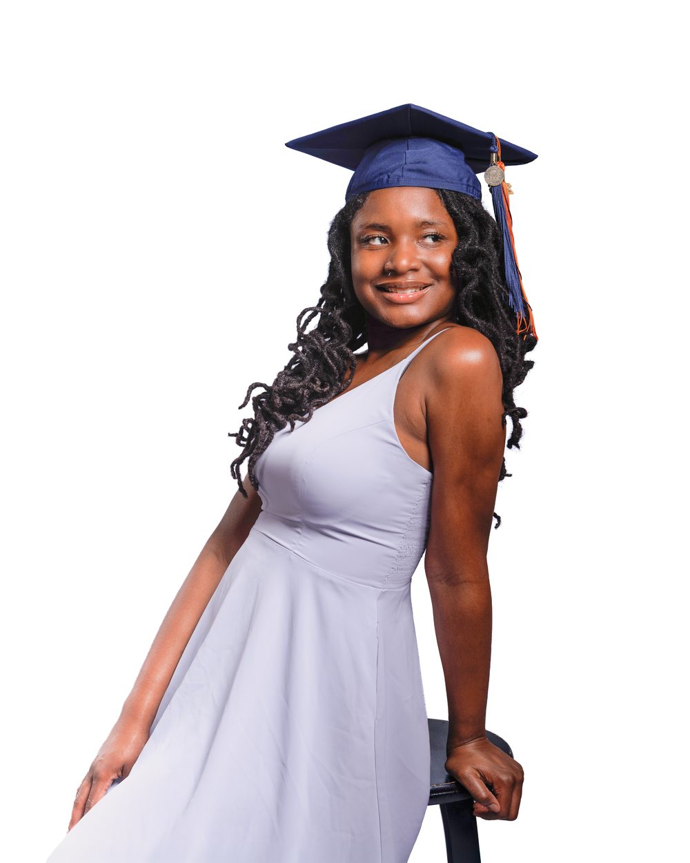Graduation portrait, looking back over shoulder