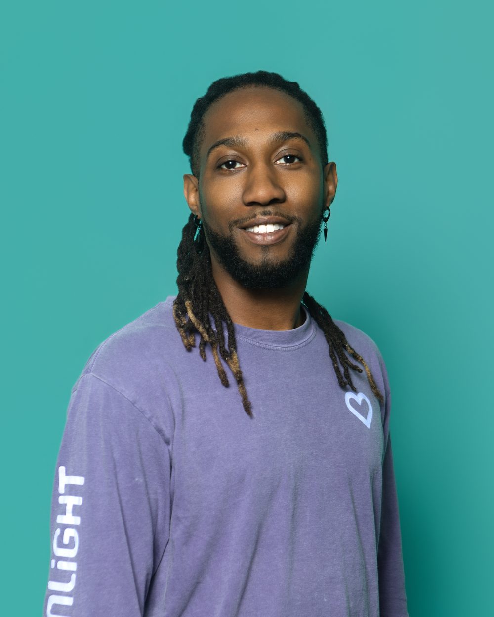 Corporate headshot, casual smile